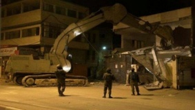 هدم 30 منشأة تجارية قرب حاجز قلنديا