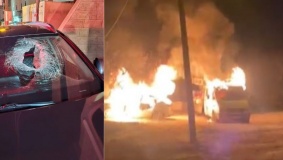 مستوطنون يعتدون ويغلقون طرقاً بالضفة