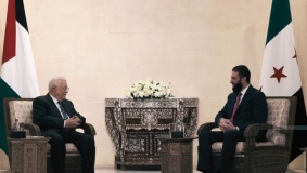 الرئيس عباس يجتمع مع نظيره السوري