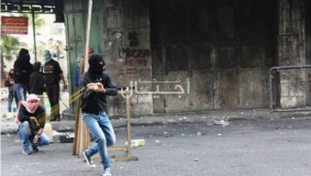 إصابات بمواجهات عقب تشييع الشهيد السكافي