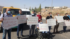 وقفة للمطالبة بتأهيل طريق قرى غرب رام الله