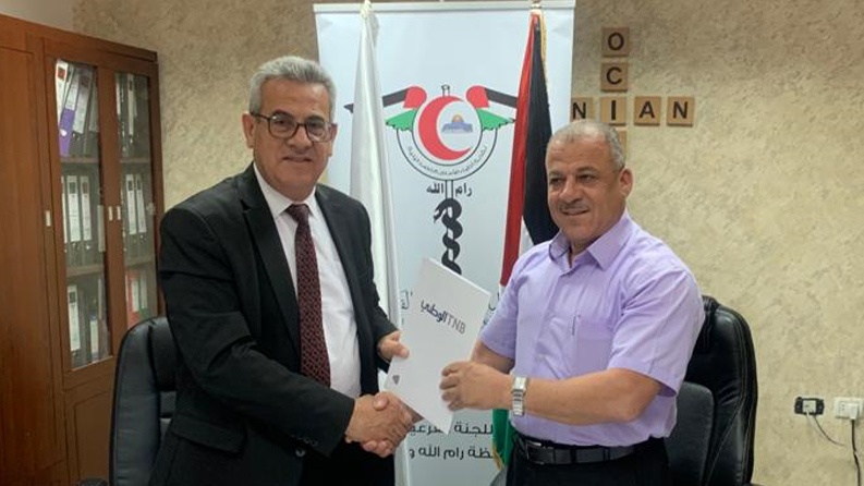 البنك الوطني ونقابة أطباء الأسنان يجددان تعاونهما الاستراتيجي