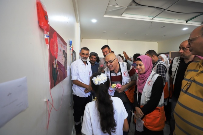 الهلال الأحمر الفلسطيني يحتفل باليوم العالمي للصحة النفسية: معاناة الأطفال خلال عام من العدوان