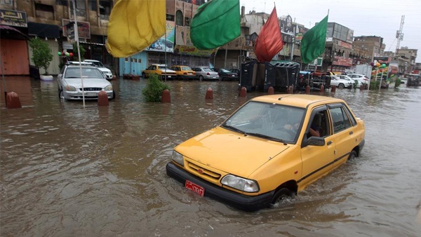 العراق: إجلاء 500 أسرة نازحة بسبب الأمطار
