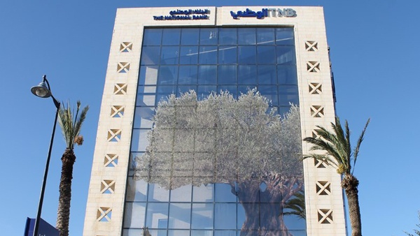 البنك الوطني يوقع اتفاقية الحافظ الأمين مع بورصة فلسطين