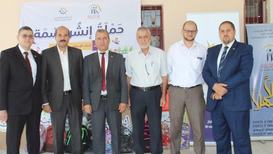 الإسلامي الفلسطيني يقدم حقائب مدرسية لمعهد الأمل للأيتام